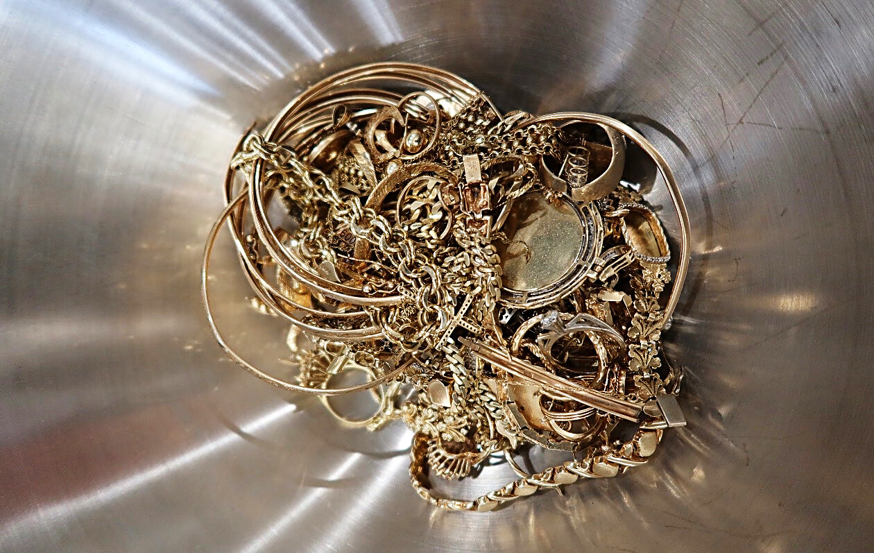 A single afternoon of scrap gold. Broken chains, single earrings, class rings, and tangled bracelets are all worth money.
