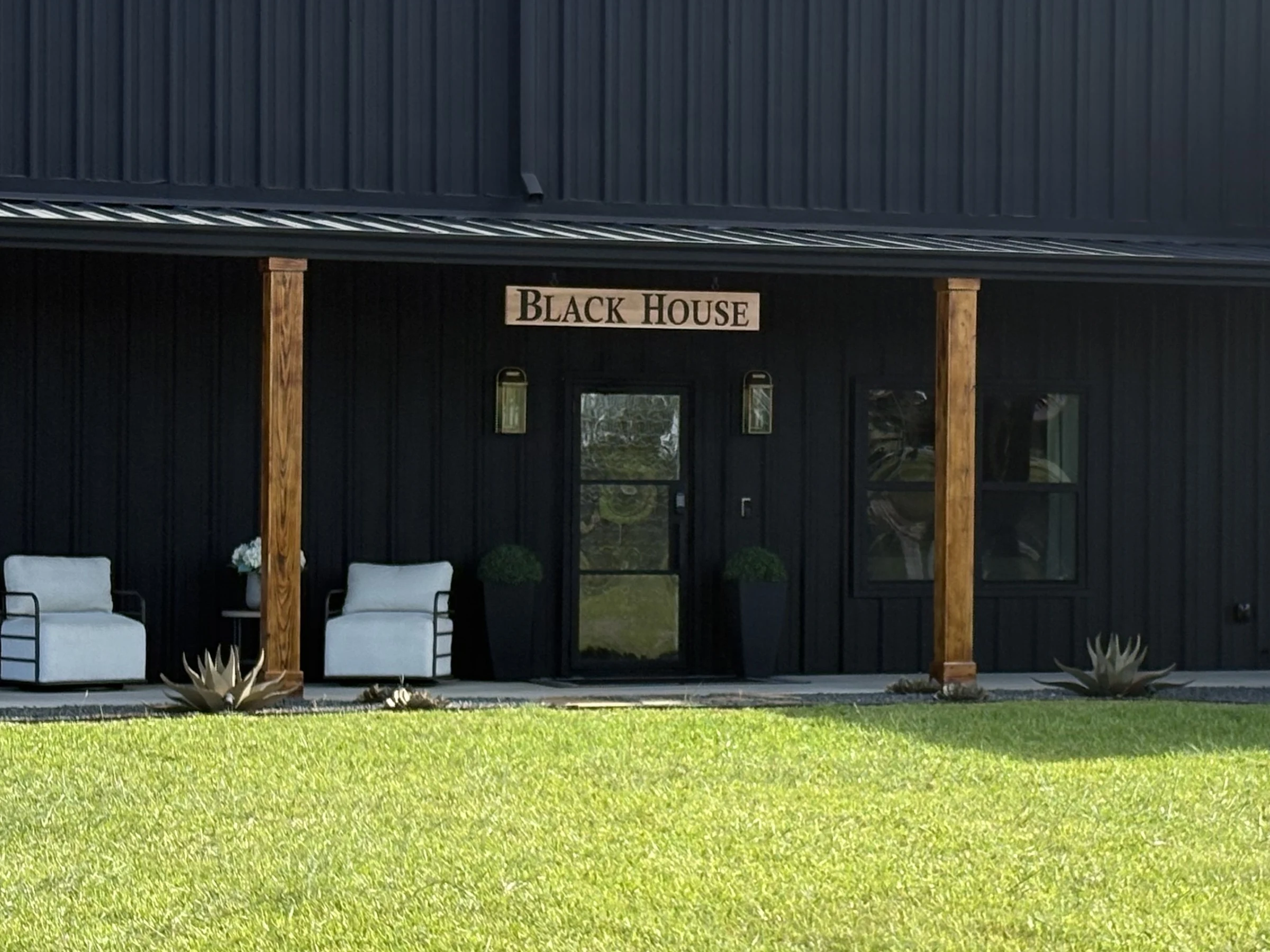 The entrance to the Black House buying office in West Friendswood, Texas.