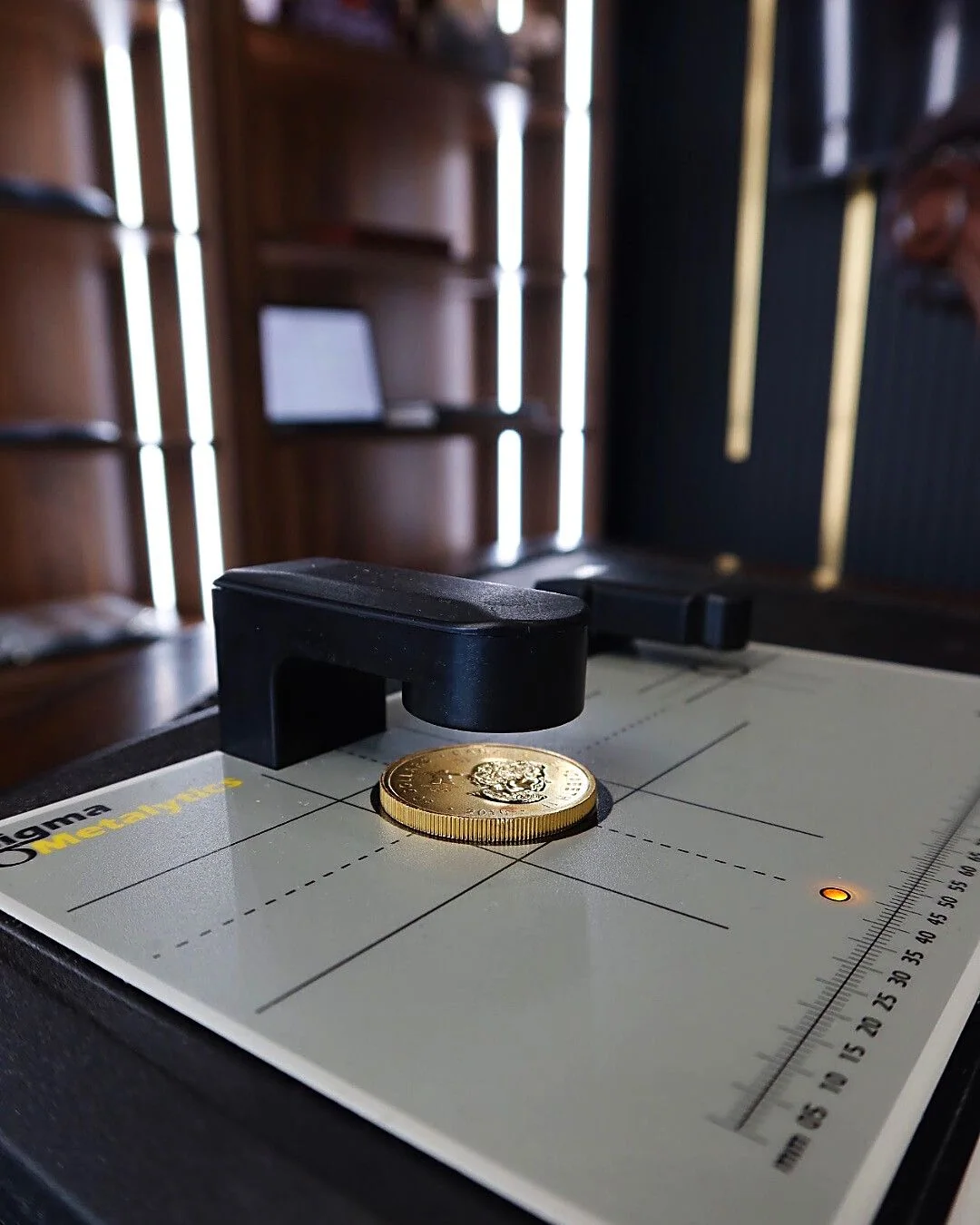 Our Sigma Precious Metal Verifier reads beneath the surface of a coin or bar by measuring how the metal conducts electricity. Every metal has its own signature, so a plated coin or a bar with a cheaper metal hidden inside cannot fool it. It takes the guesswork out of the game, for you and for us.